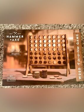 The Hammer + Axe 4-in-a-Row Wooden Gaming Set with Carrying Bag